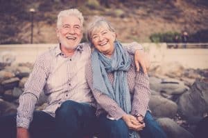 A senior couple discussing their options for inheriting a property with equity release