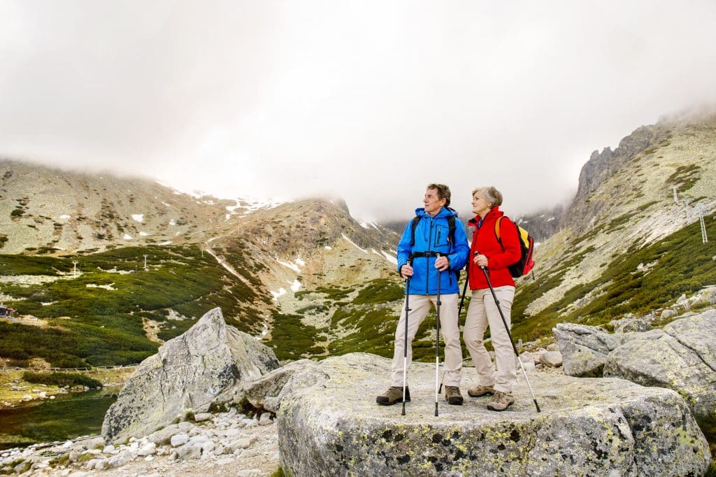 Couple hiking discussing Later Life Finance Yorkshire equity release