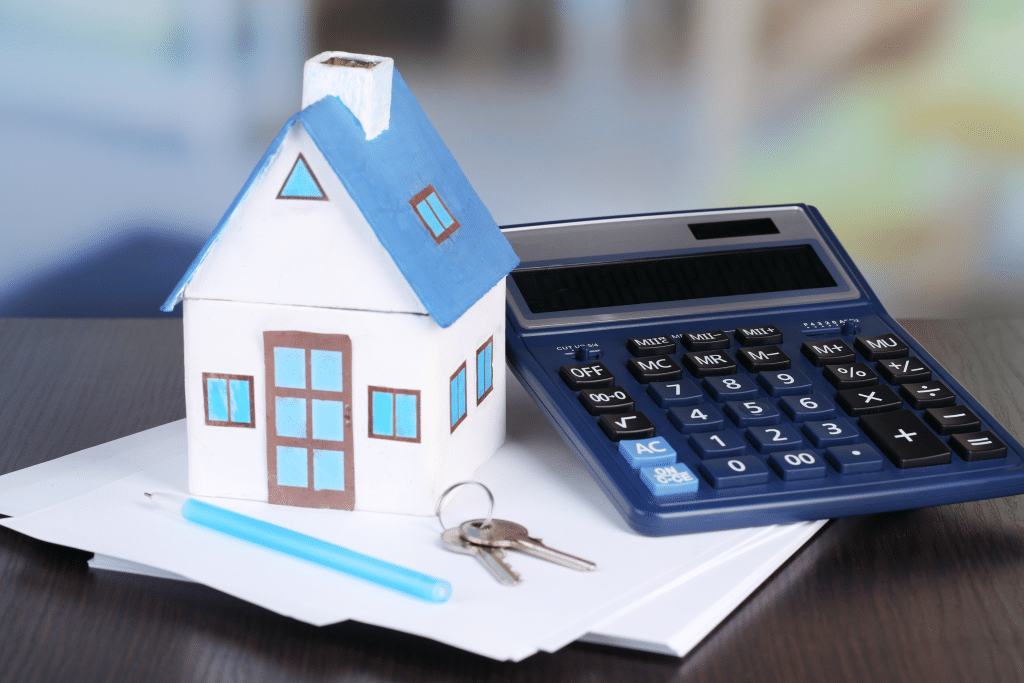 An Equity Release Compound interest calculator and model of a house with keys