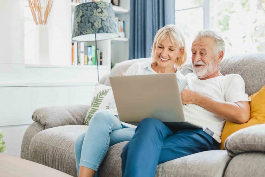 older couple looking at lifetime mortgages and Equity release on the internet